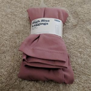 A pair of pink ribbed leggings for sale